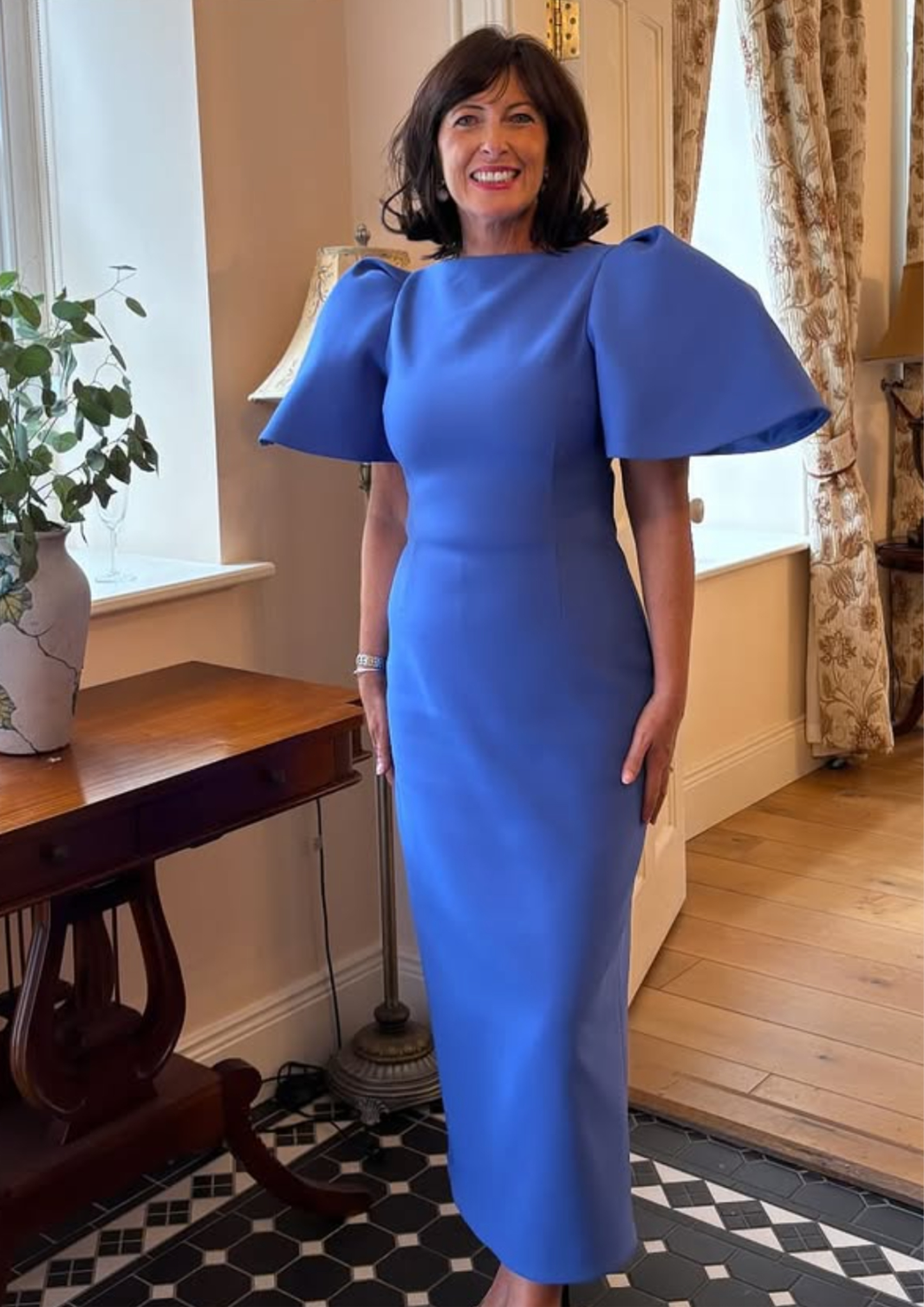 The Lora Midi Dress is Blue